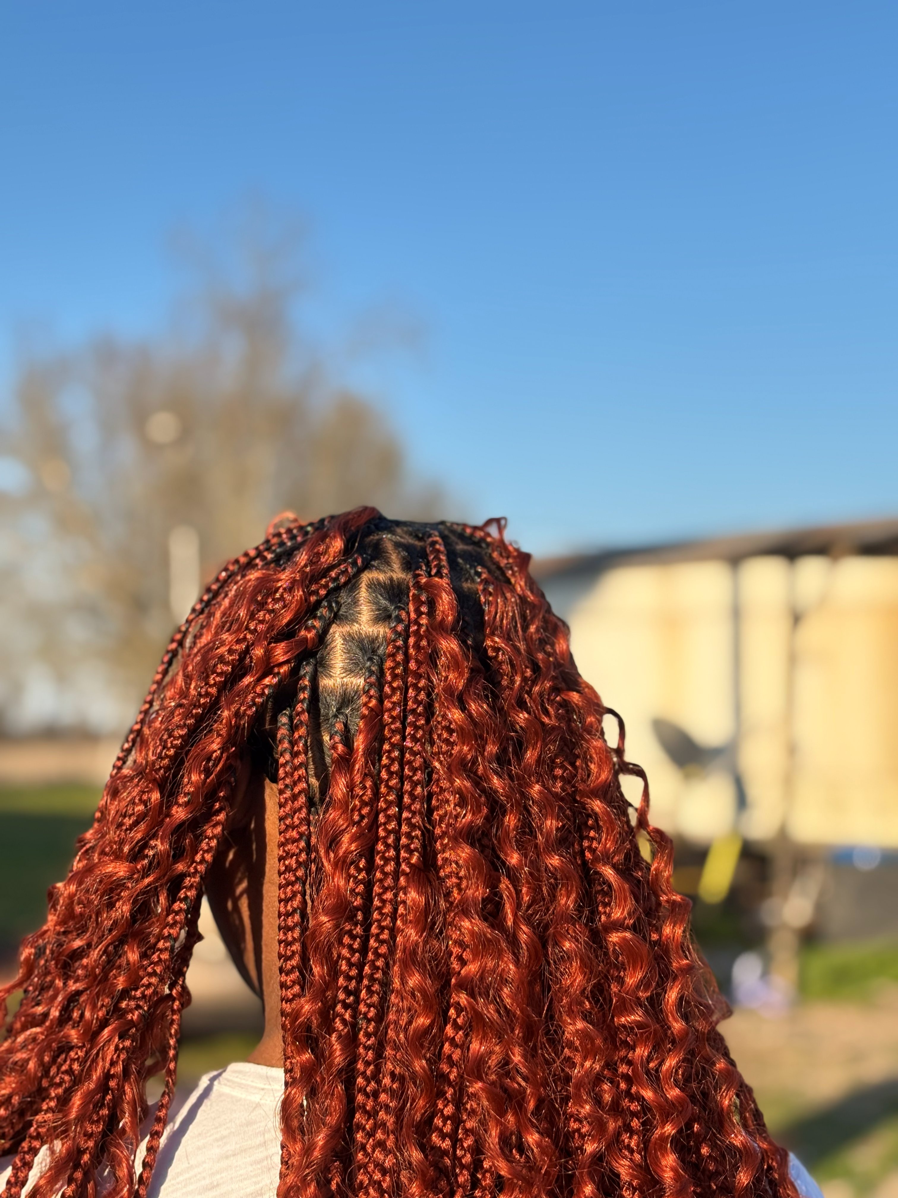 Tribal braids combined with knotless style