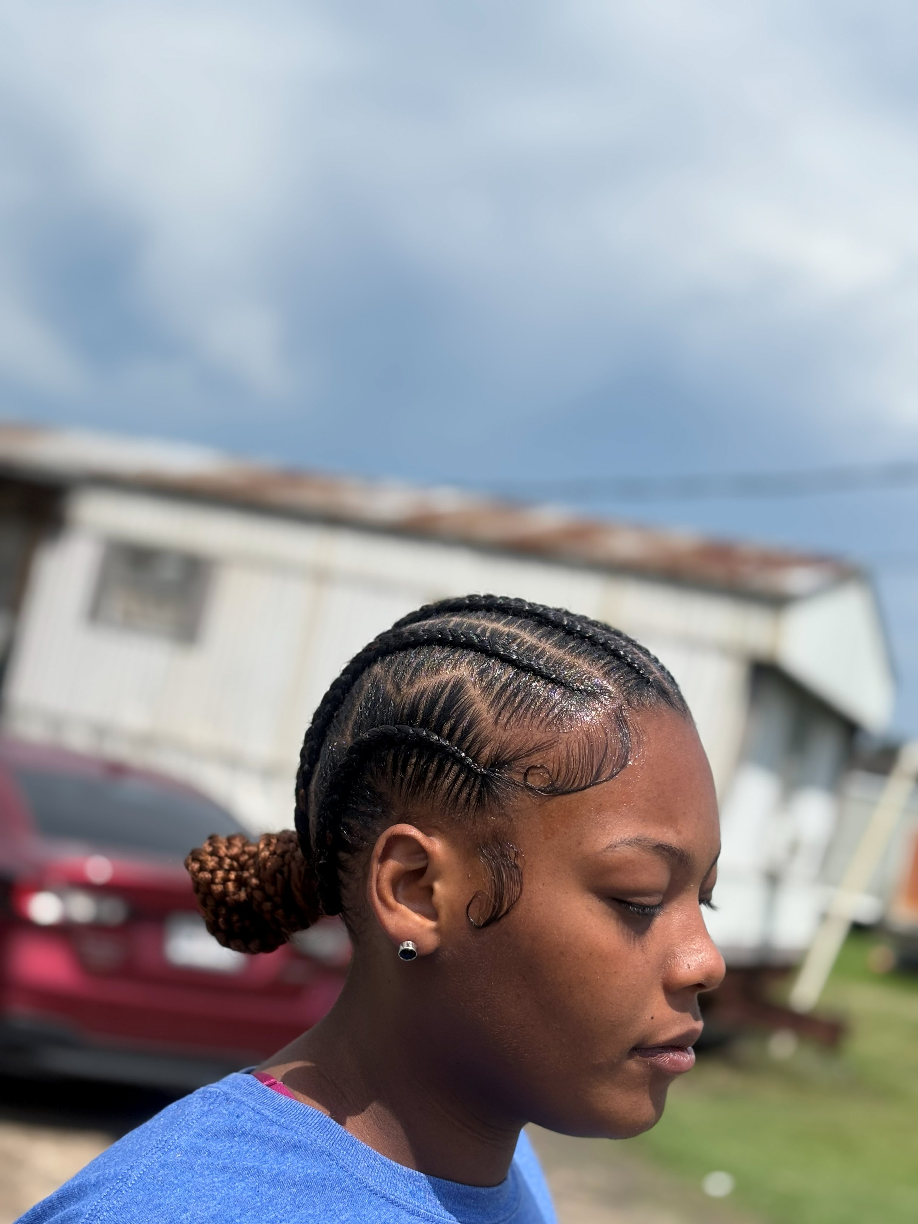 Large knotless braids styled by Brilyn